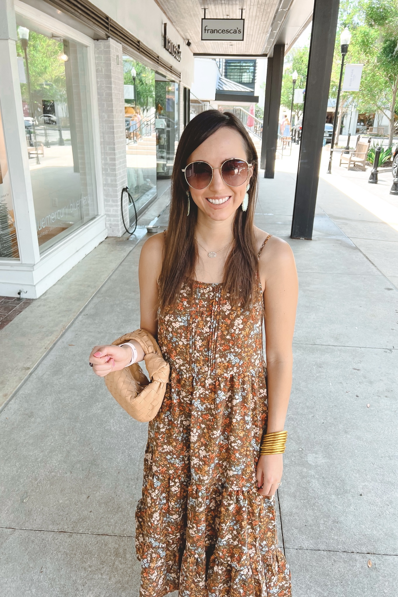 harvest wishes floral maxi dress with gucci sunglasses and mini jodie dupe almond