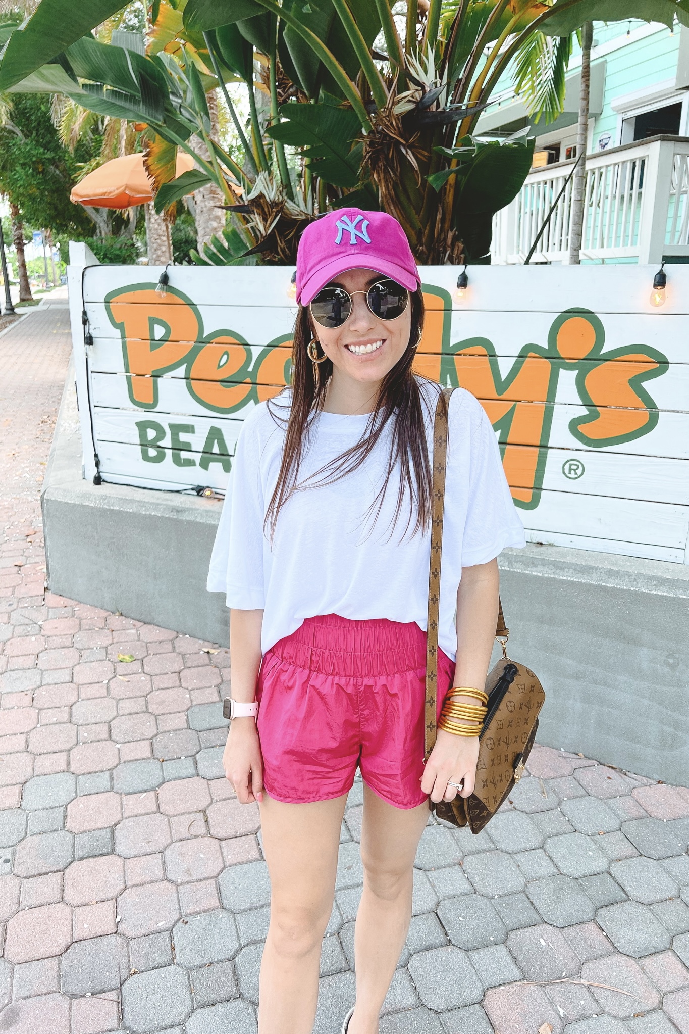 free people way home shorts with white tee and yankees hat