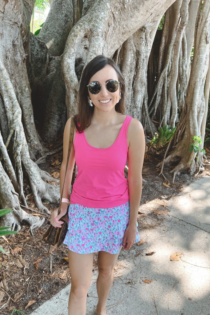 lilly pulitzer blue skort with pink tank and louis vuitton pochette metis