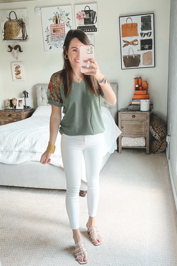 amazon green lace sleeve tee with white jeans and clear stud sandals