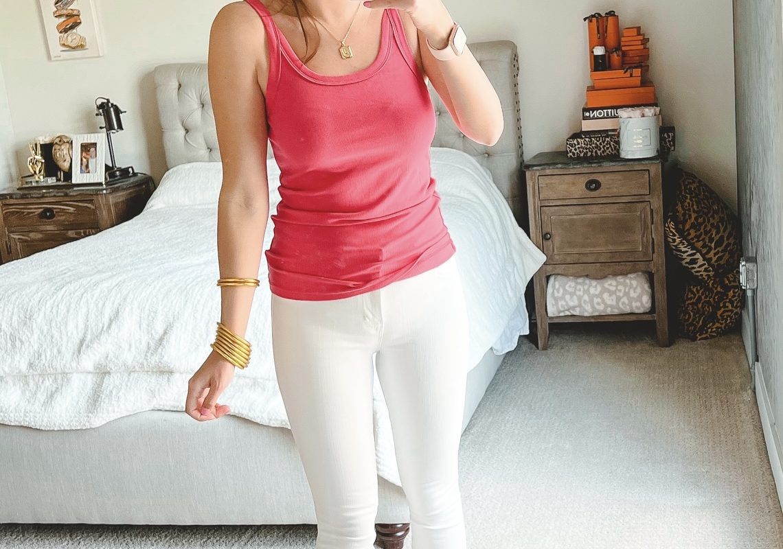 amazon pink ribbed tank with white jeans and clear stud sandals