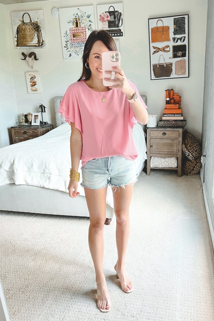amazon pink flutter sleeve top with agolde denim shorts and budhagirl bangles