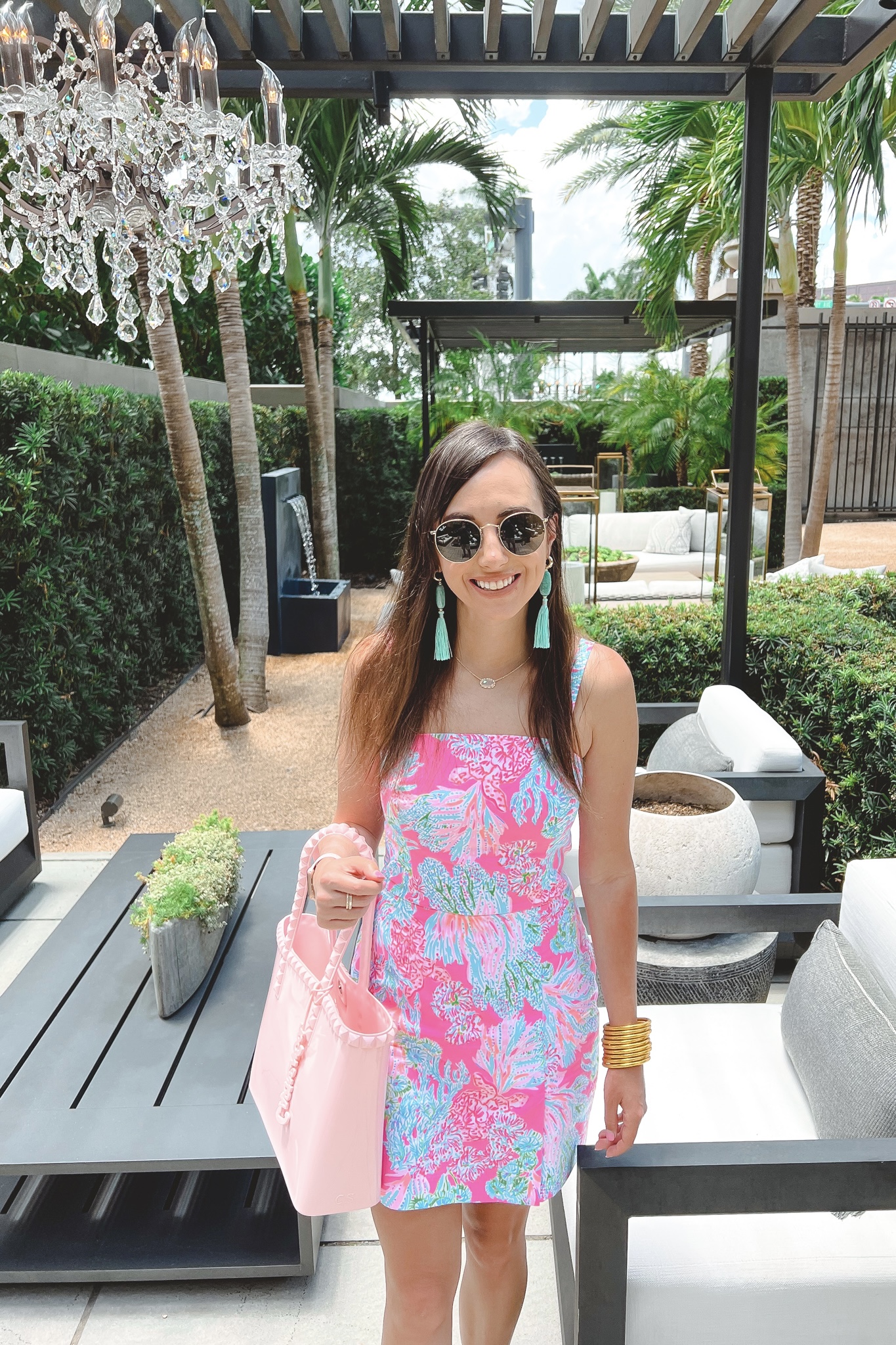 lilly pulitzer lawless romper with carmen sol seba pink tote and kendra scott jewelry