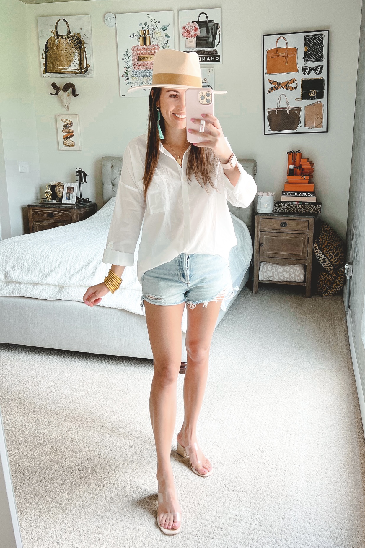 crisp white top with agolde denim shorts and turquoise earrings