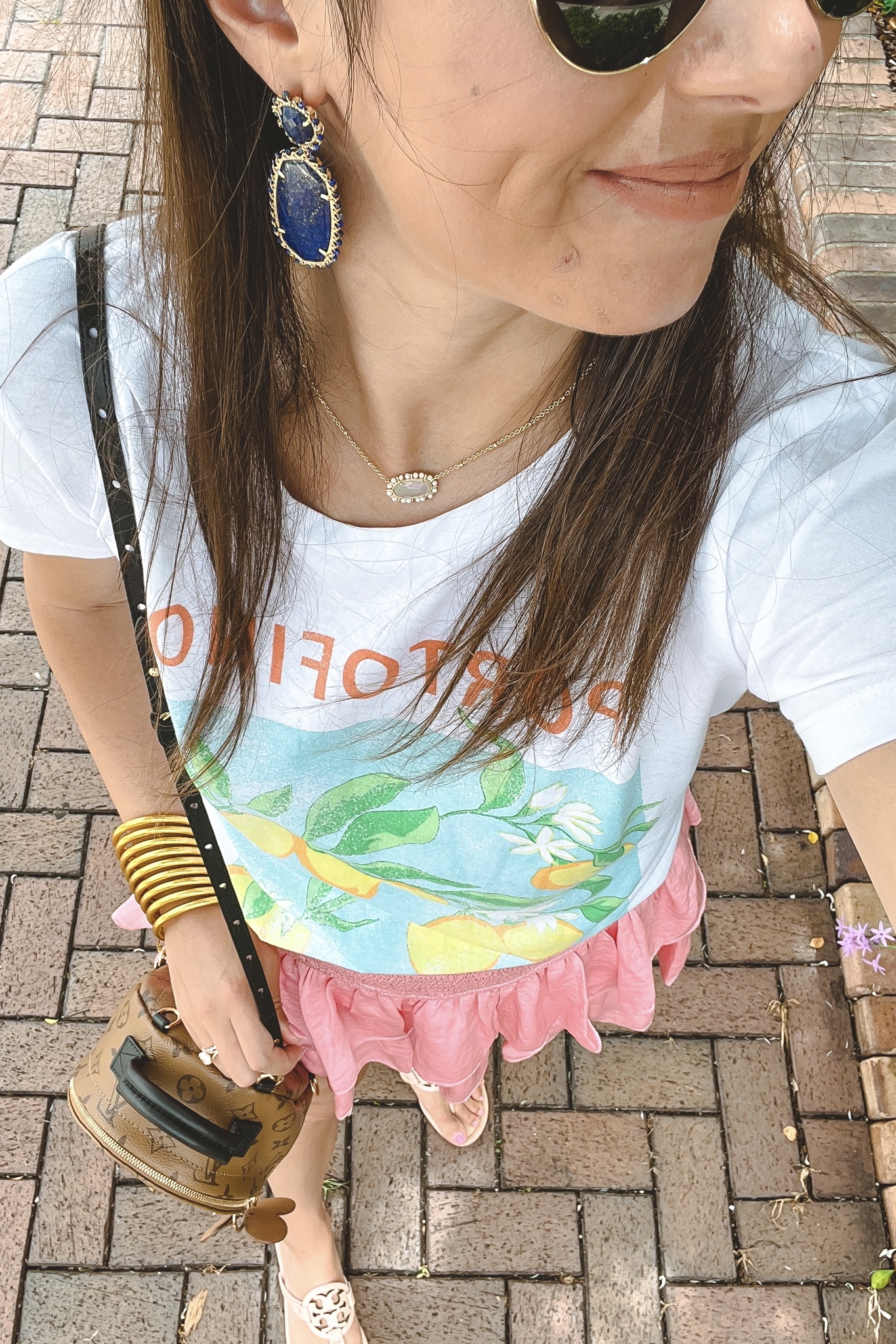 chaser portofino tee with pink skort and kendra scott parsons earrings