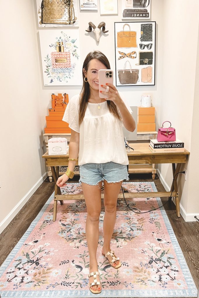 amazon white short sleeve blouse with agolde denim shorts and stud sandals