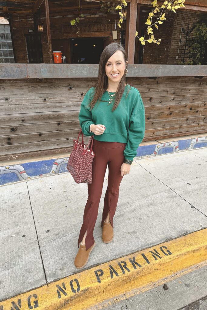 chaser green sweatshirt with abercrombie split hem flares and goyard tote
