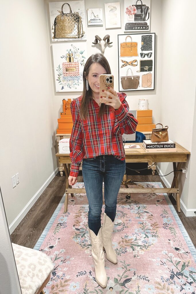 red tartan blouse with dark denim and white cowgirl boots