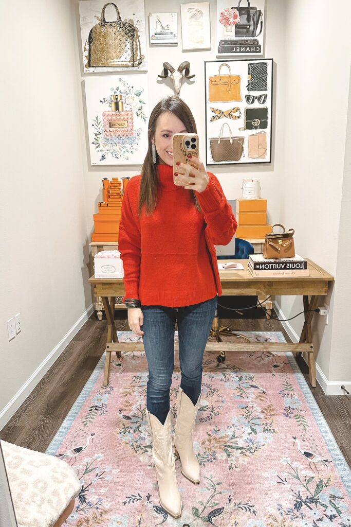 red turtleneck sweater with dark denim and white cowgirl boots