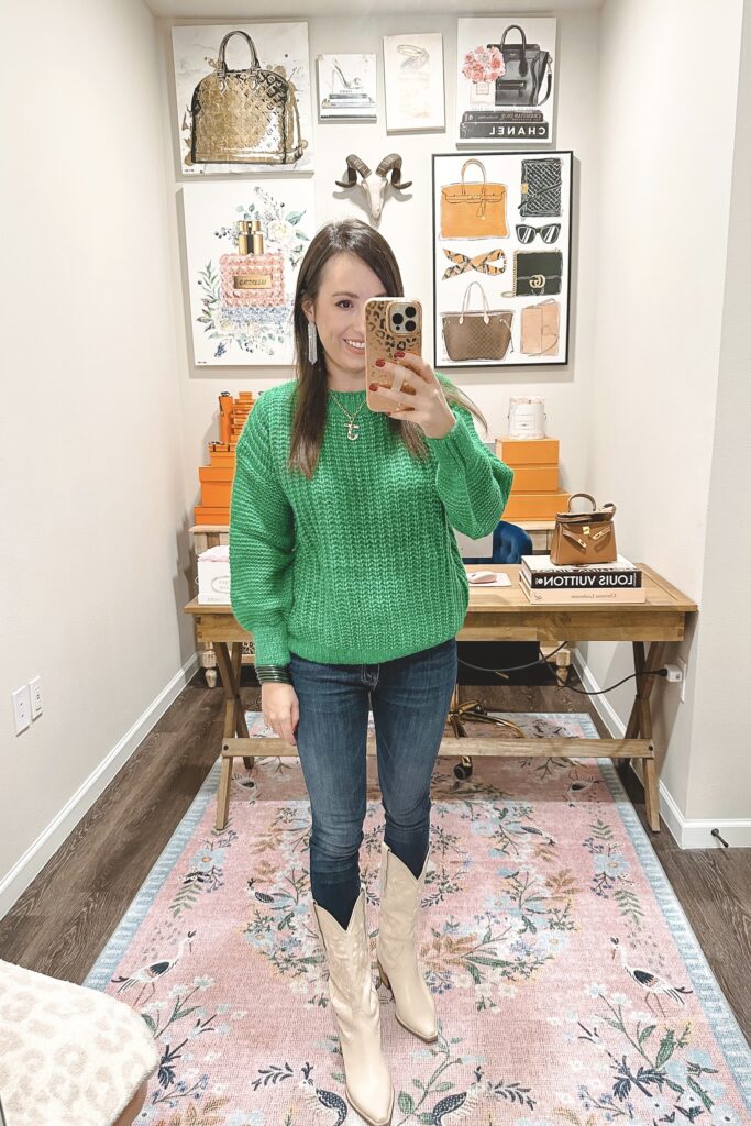 green sweater with dark denim and white cowgirl boots