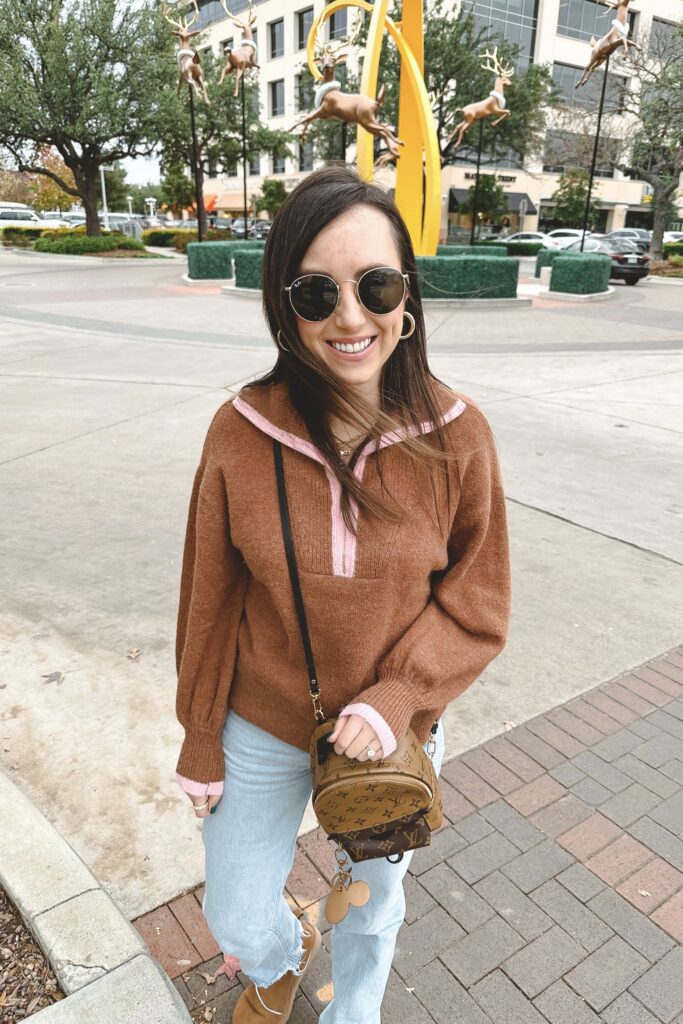 kitri brown sweater pullover with agolde jeans and louis vuitton palm springs mini