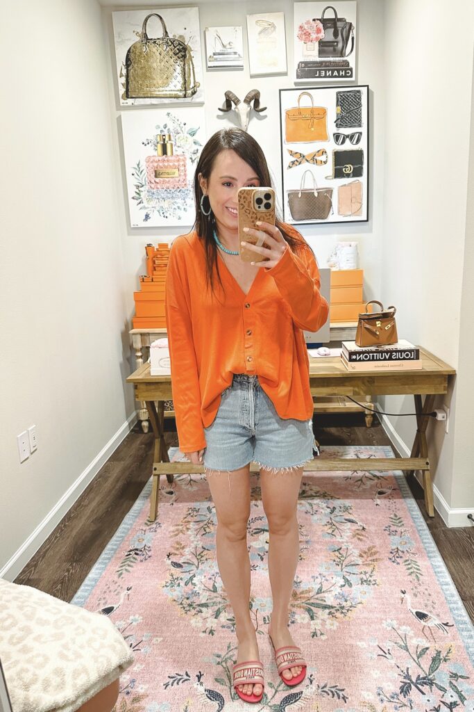 Chaser orange ribbed top with agolde dee shorts
