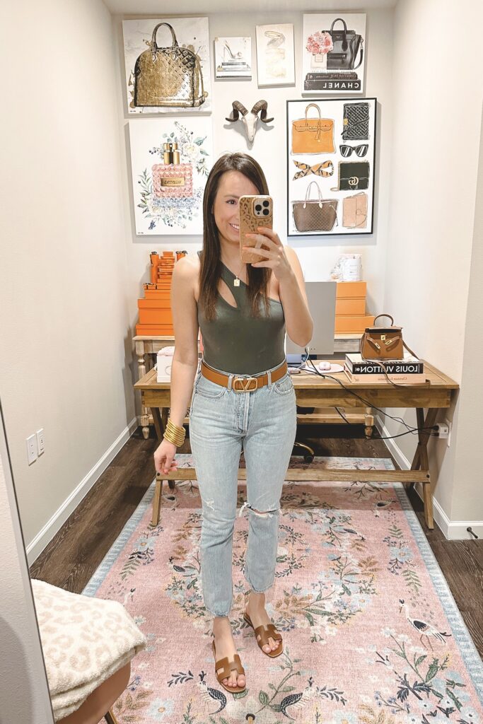 amazon green cutout one shoulder bodysuit with agolde jeans and valentino belt
