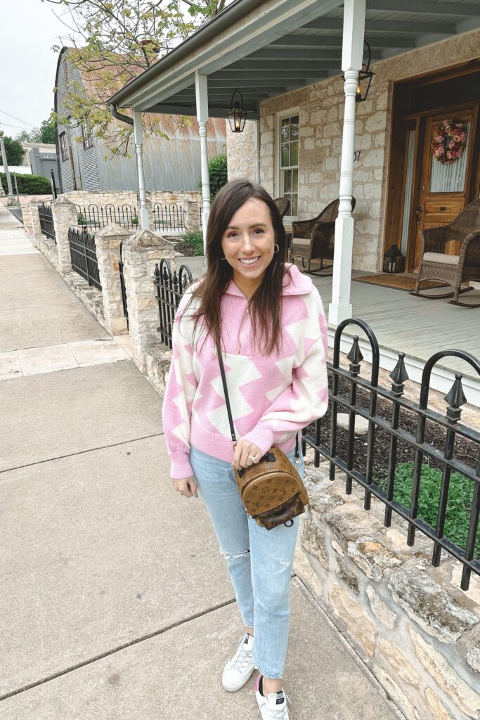 kitri zig zag pink sweater with agolde jeans and louis vuitton palm springs mini
