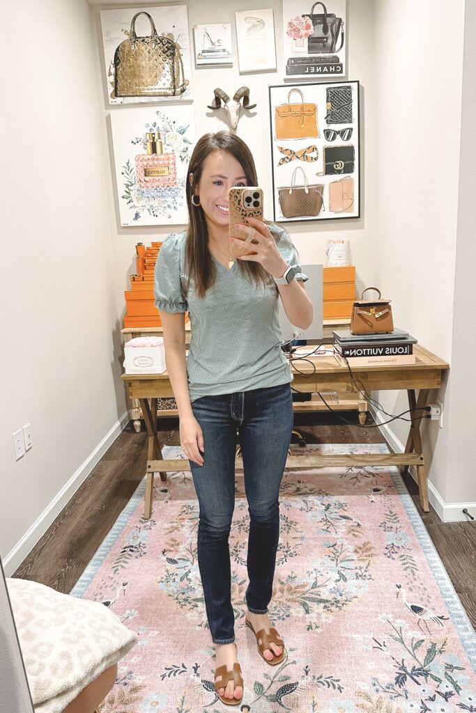 amazon sage green eyelet tee with dark blue skinny jeans and hermes oran sandals