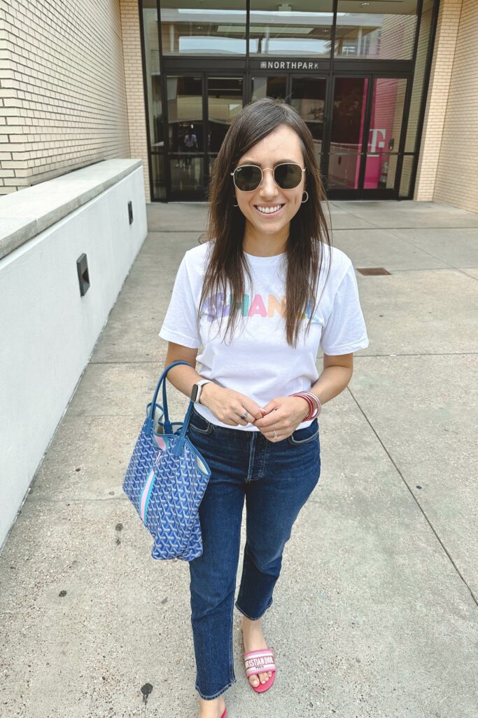 chanel colorful tee with agolde riley denim and goyard blue tote