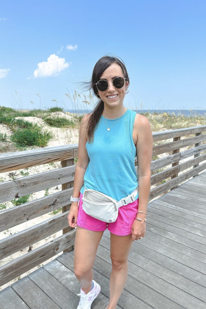 Lululemon train to be tank in tidal teal with hotty hot shorts in sonic pink and white opal belt bag