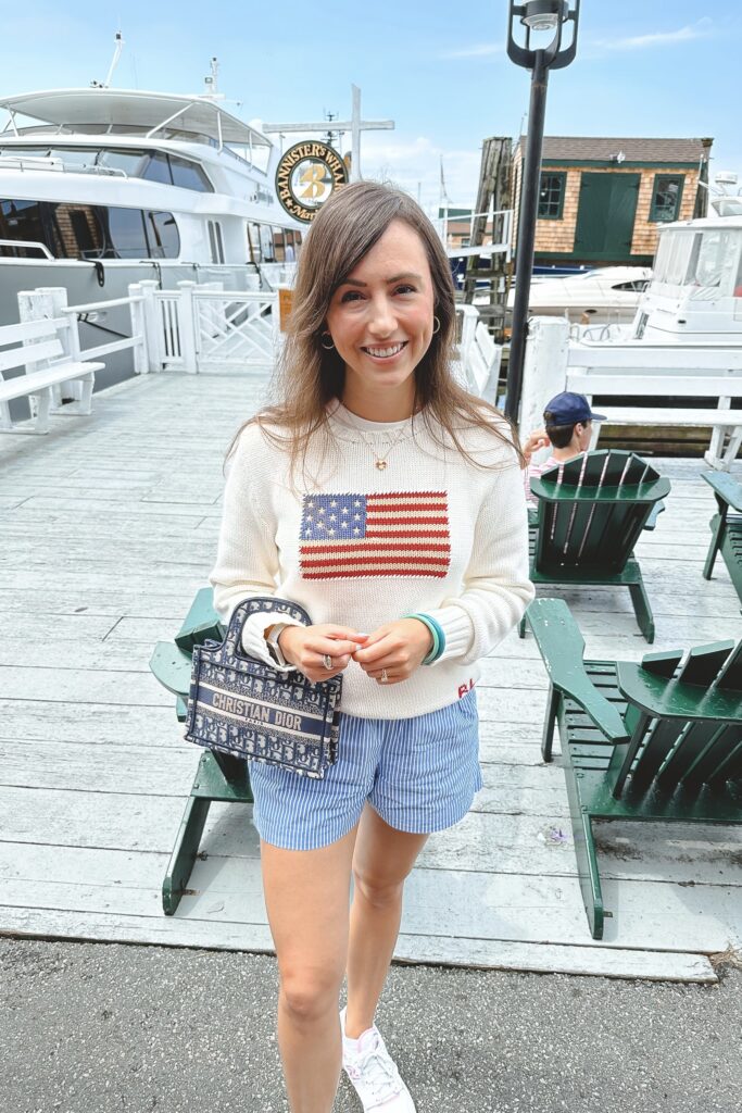 Ralph Lauren white flag sweater with j crew blue stripe shorts and dior mini book tote