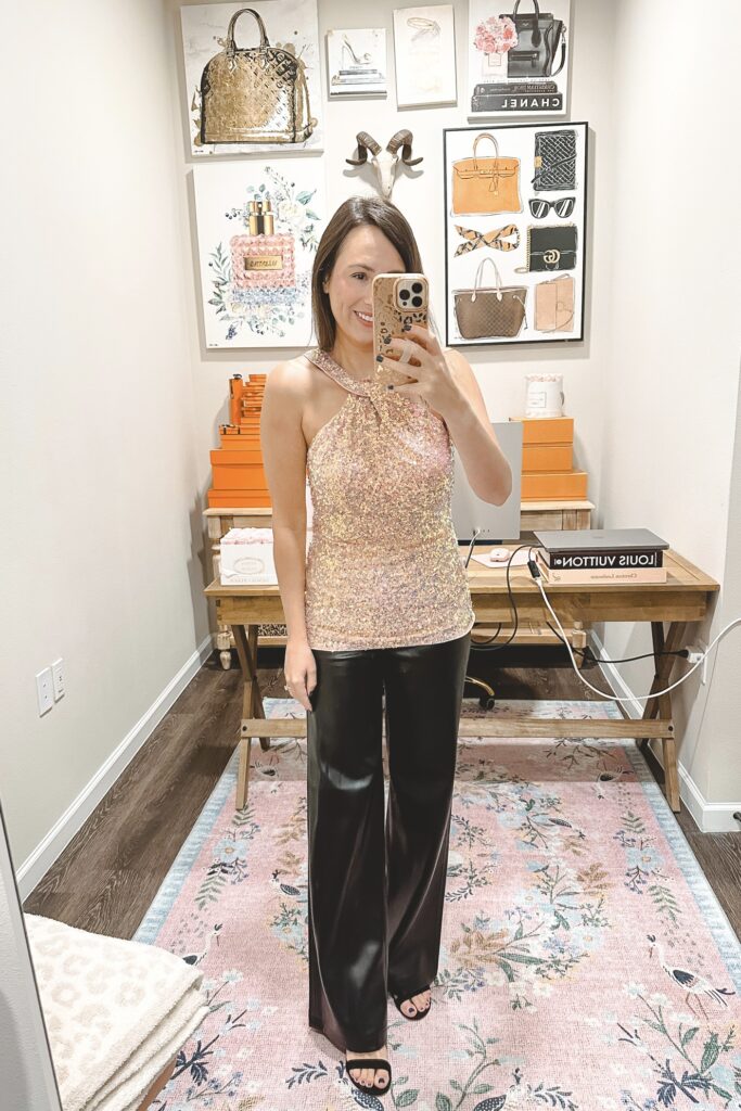 Amazon pink sequin halter top with black wide leg faux leather pants