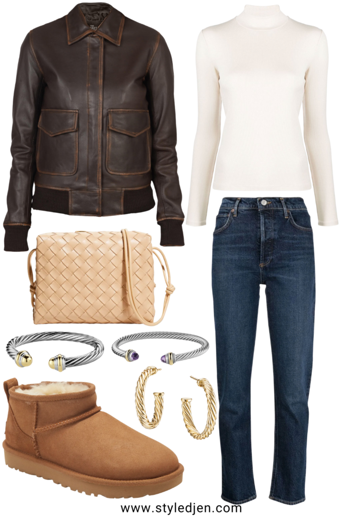 Brown leather bomber jacket with dark wash jeans and ugg ultra mini boots