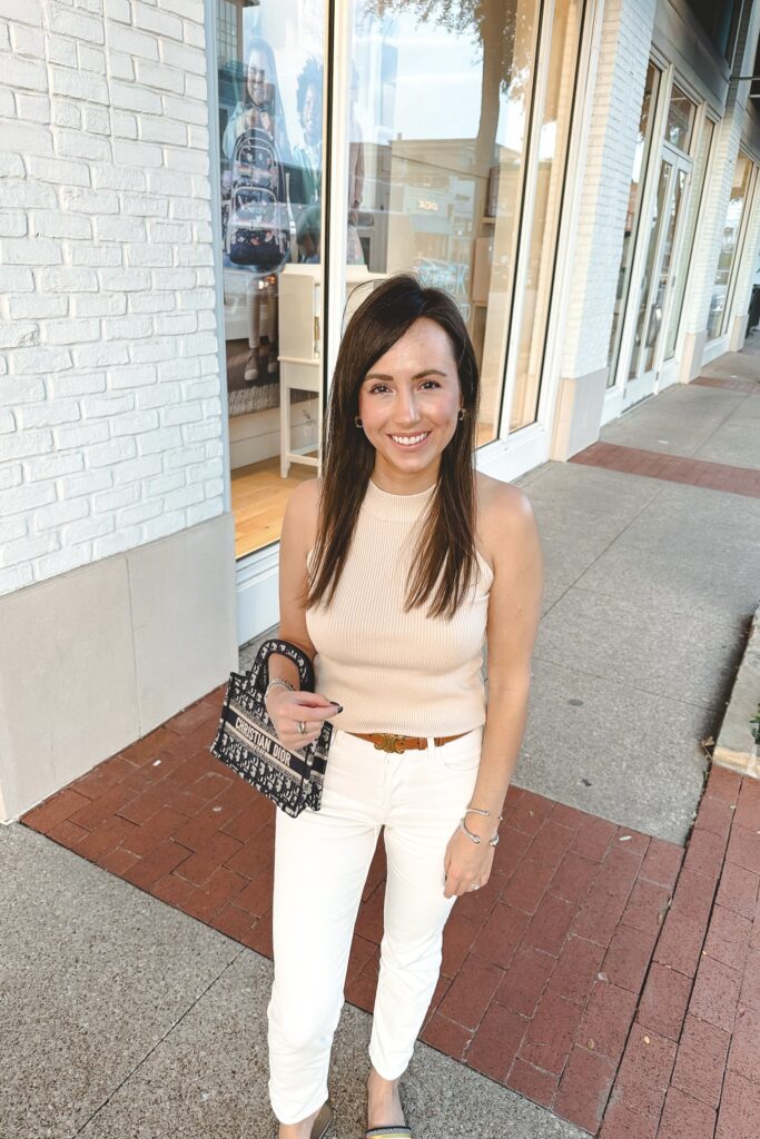 Ivory sweater tank with ecru jeans and celine belt
