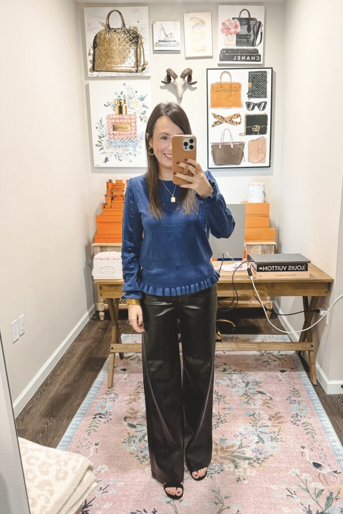 Amazon blue sweater top with black wide leg faux leather pants
