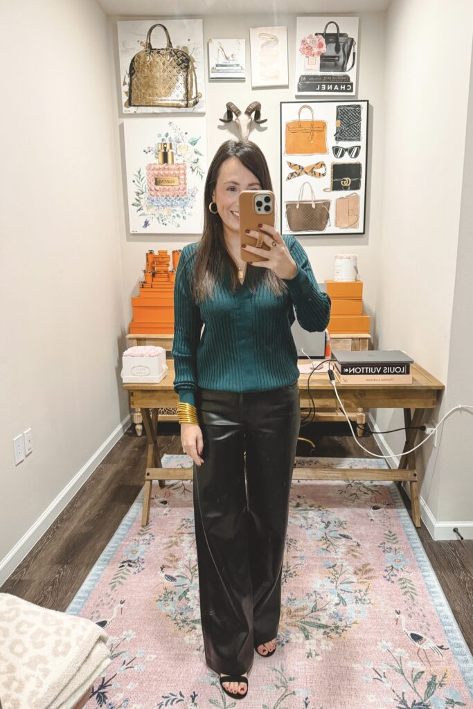 Amazon green polo sweater top with black wide leg faux leather pants