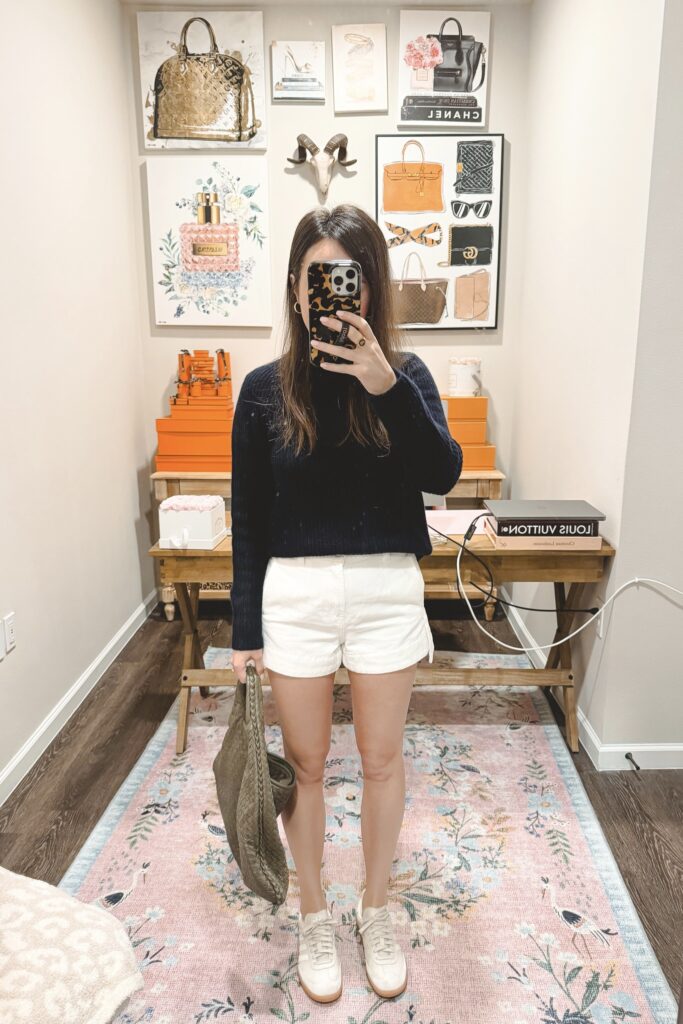 Vince navy cashmere sweater with 7 for all mankind white denim shorts