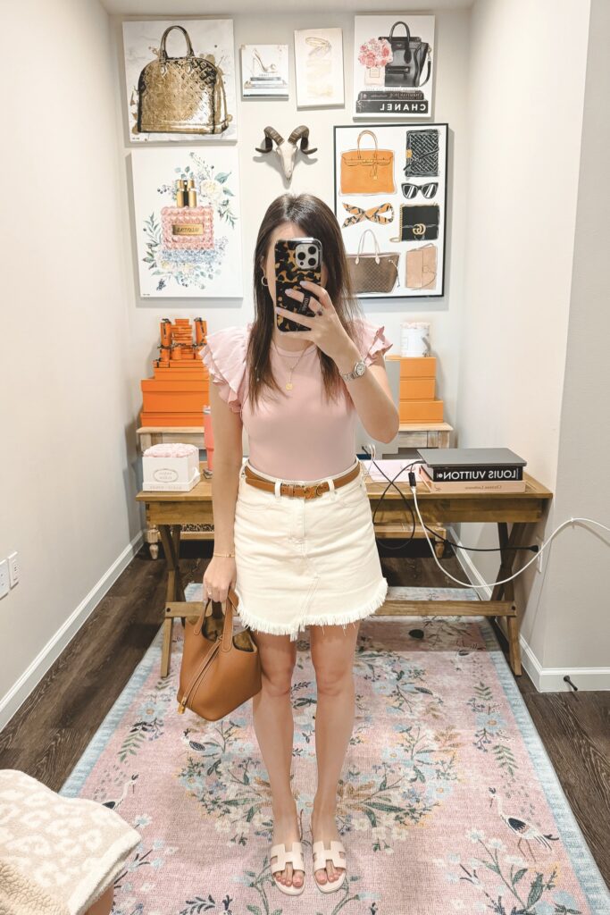 Amazon ribbed pink short sleeve bodysuit with ecru denim skirt and rose petale hermes oran sandals