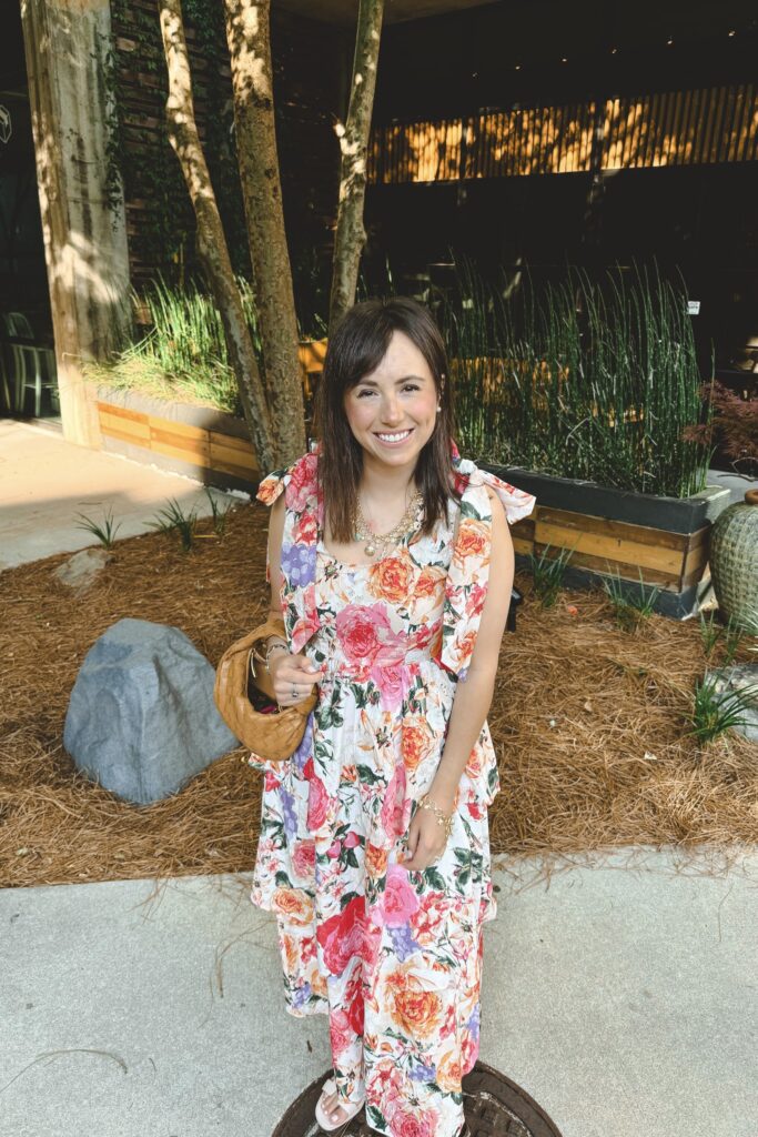 Buddylove floral tiered midi dress with bottega veneta mini jodie and kendra scott shell charm necklace