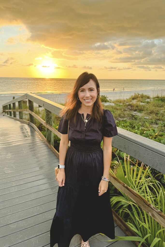 Quince navy tiered maxi dress with florida beach sunset