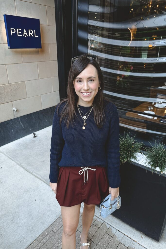 Navy crew neck sweater with zara maroon balloon skirt