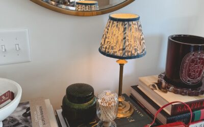 Console table with pooky lamp and red the row 90s bag