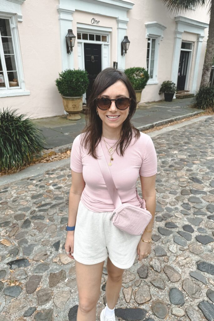 Lululemon hold tight tee pink haze with aritzia oatmeal fleece shorts and lululemon pink haze belt bag