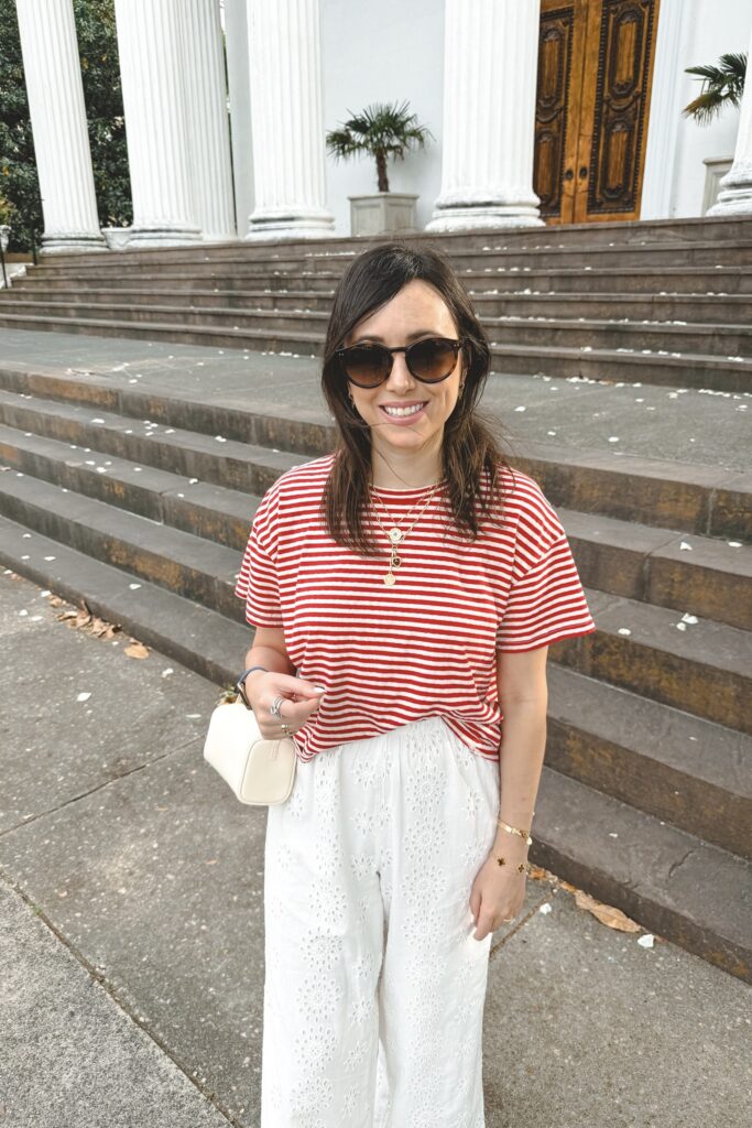Red stripe tee with z supply white eyelet pants and the row ivory 90s bag