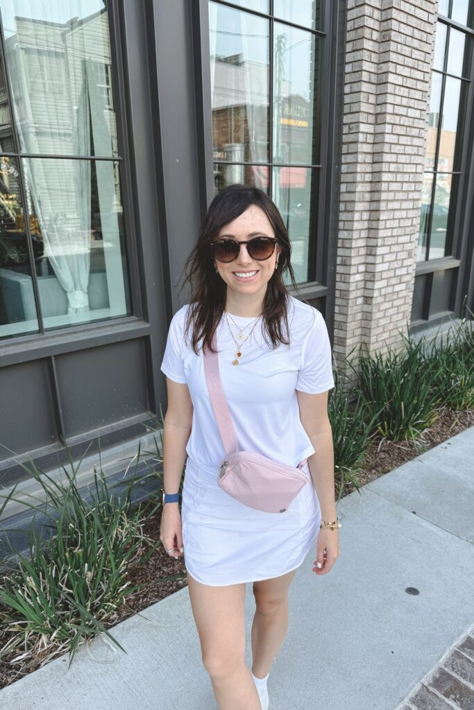 Lululemon ultralight tee white with lululemon hotty hot skort white and lululemon pink haze belt bag