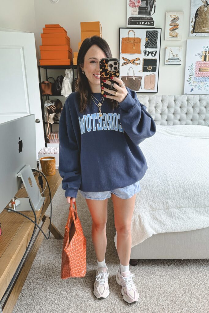 Brandy georgetown sweatshirt with j crew boxer shorts and orange goyard tote