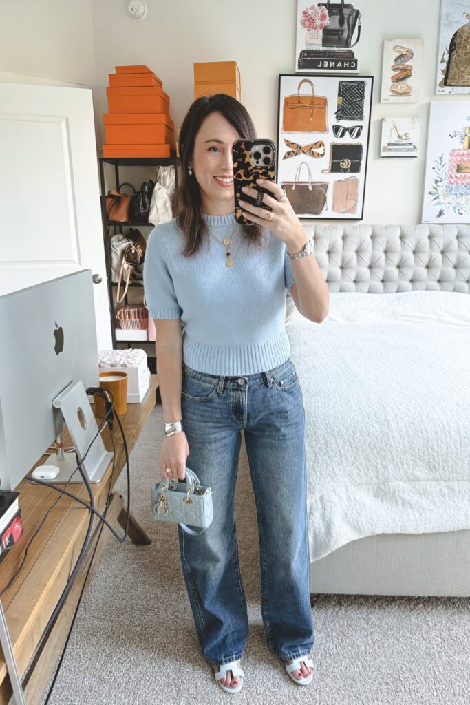 Toccin light blue short sleeve cashmere sweater with baggy jeans and hermes bleu glacier oasis sandals 