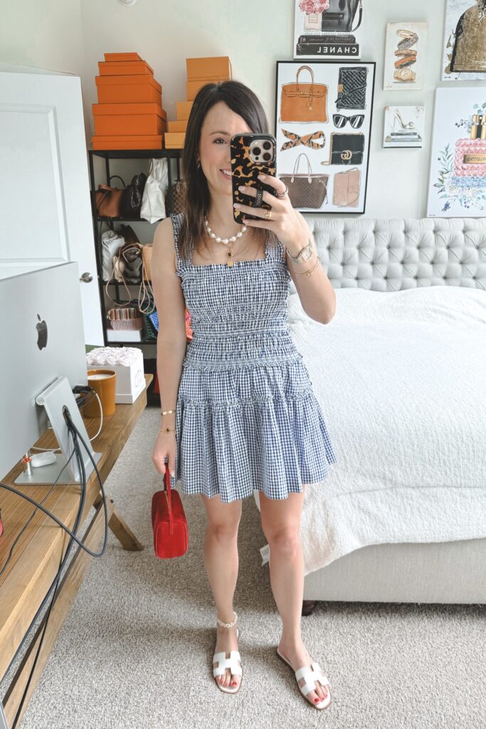 Hill house navy gingham azalea dress with red the row 90s bag and white hermes oran sandals