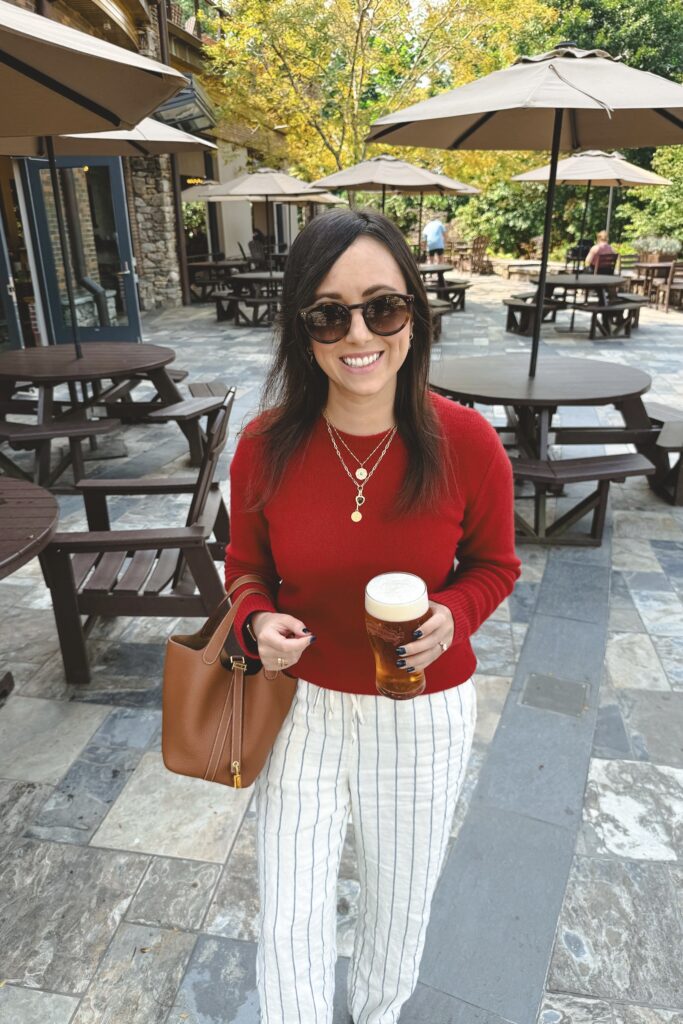 Vince red sweater with jcrew stripe linen pants and hermes gold picotin
