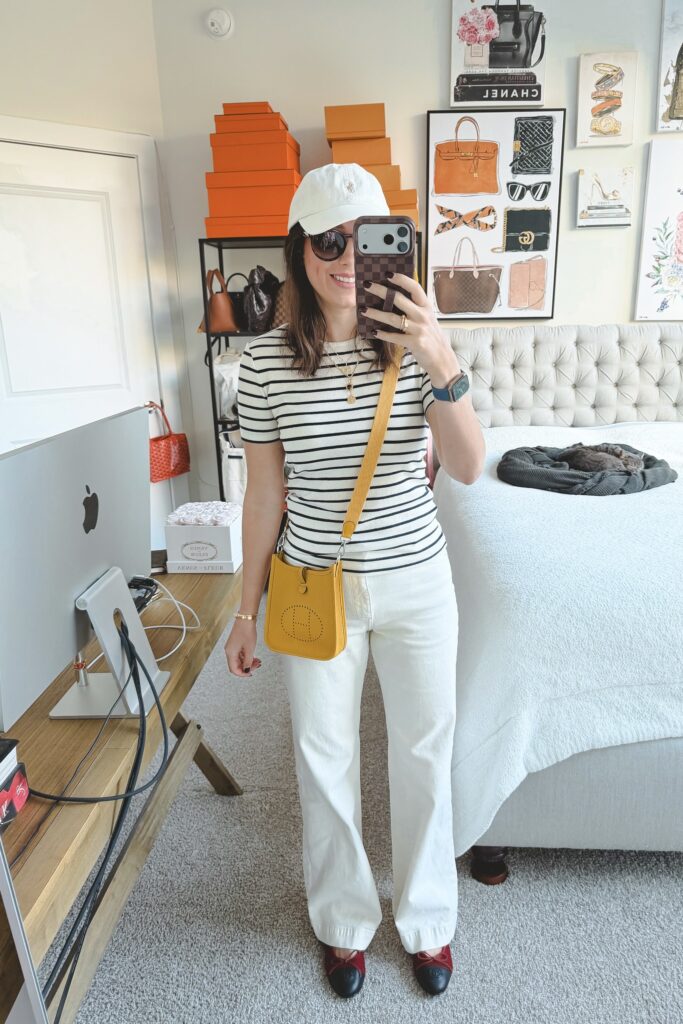 La ligne striped tee with white baggy jeans and hermes mini evelyne