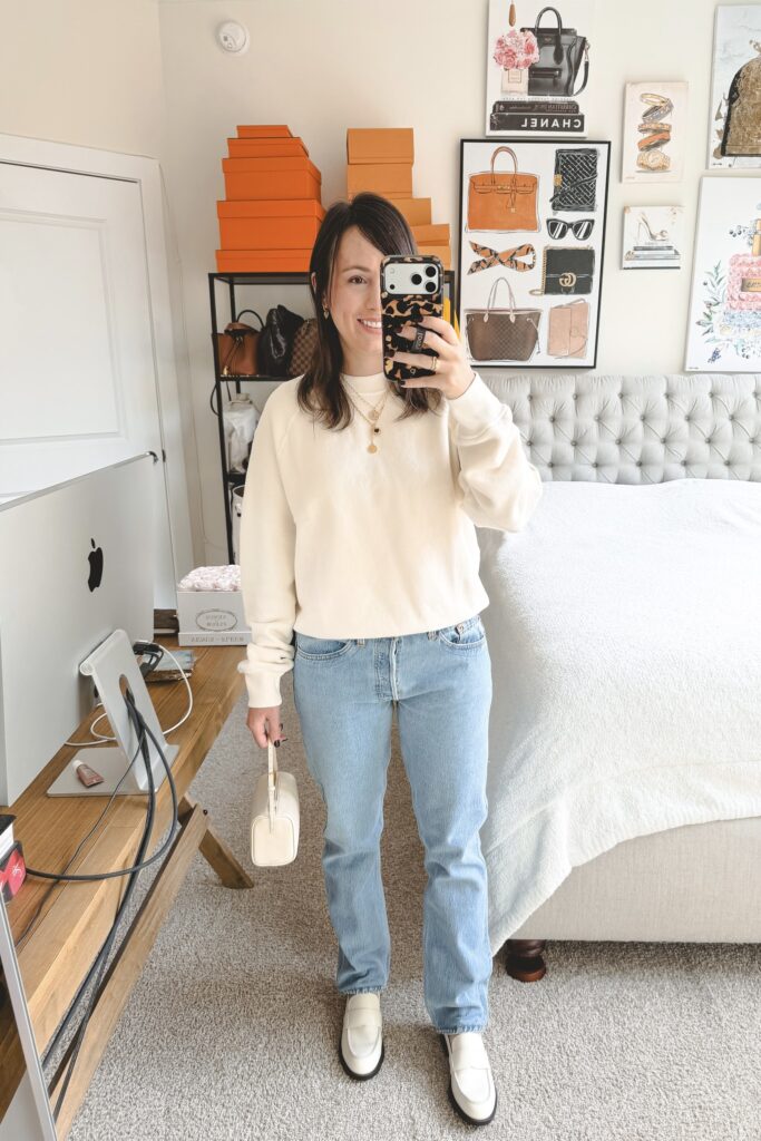 Redone Hanes cream sweatshirt with Redone levi's low slung straight leg jeans